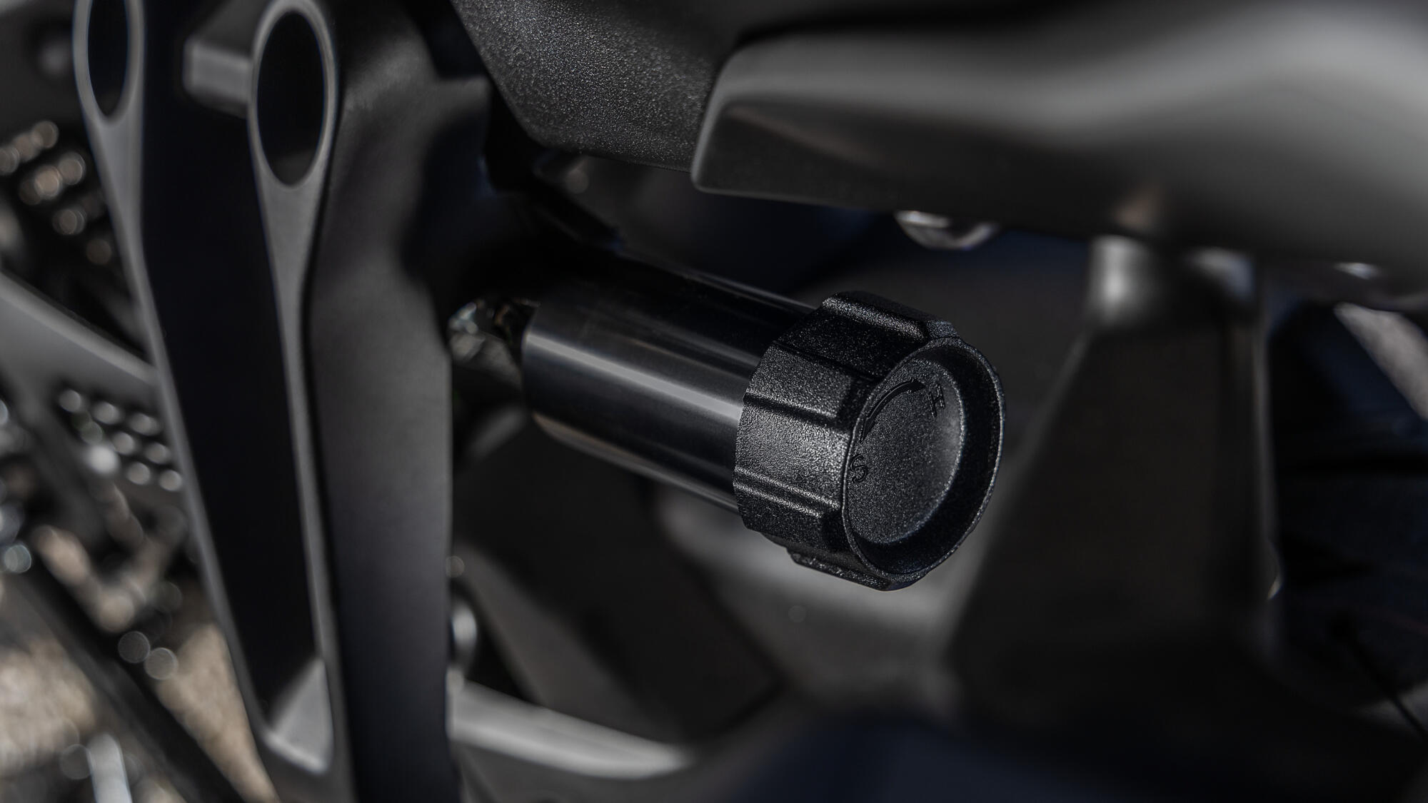 Touring-grade suspension with remote pre-load adjustment